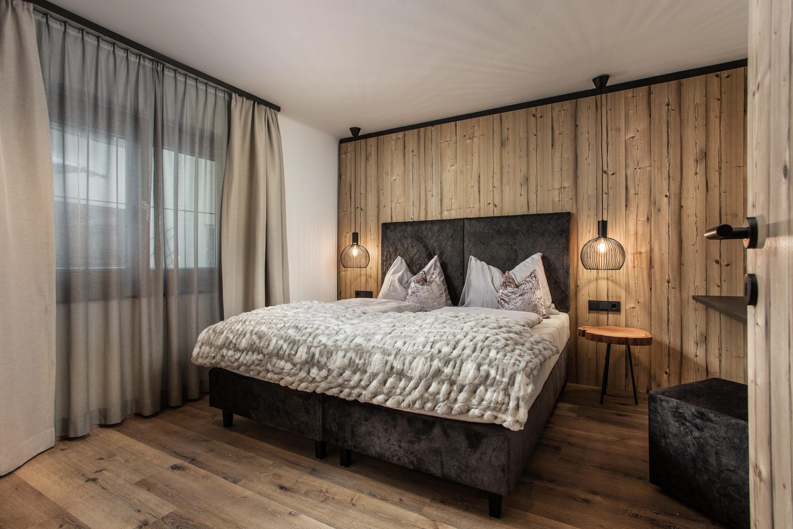 Hager’s Apartments / Schlafzimmer in Saalbach by Gappmaier Design
